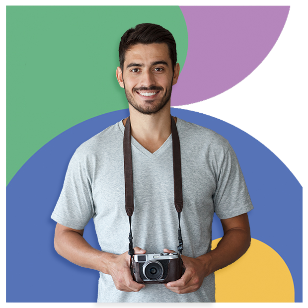 A boy holding a camera